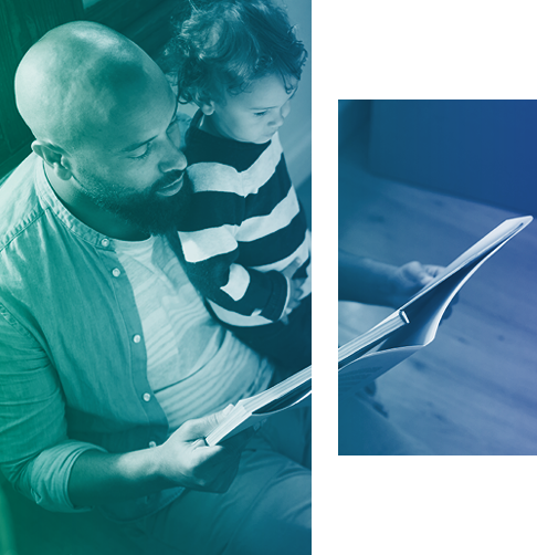 A man reads a book to his child. 