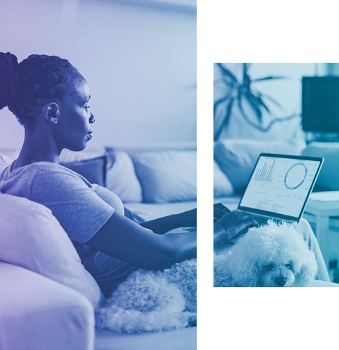 Woman sitting on a couch next to her dog, looking at a laptop screen showing investment charts. 
