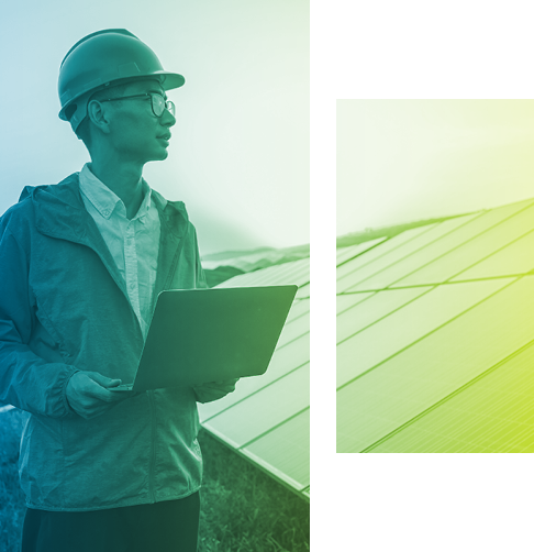 Engineer in a hardhat checking solar panels. 